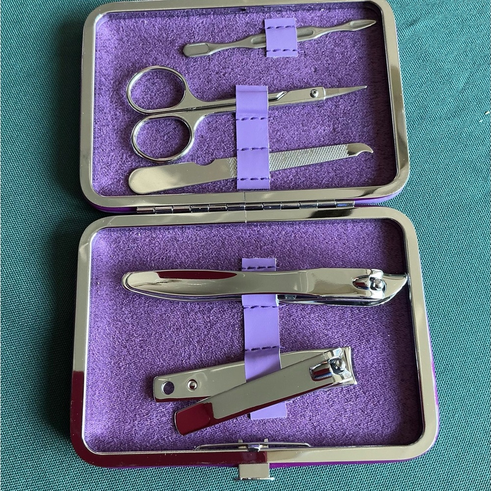New Purple Manicure Set with Silver Tools and hard case from Avon